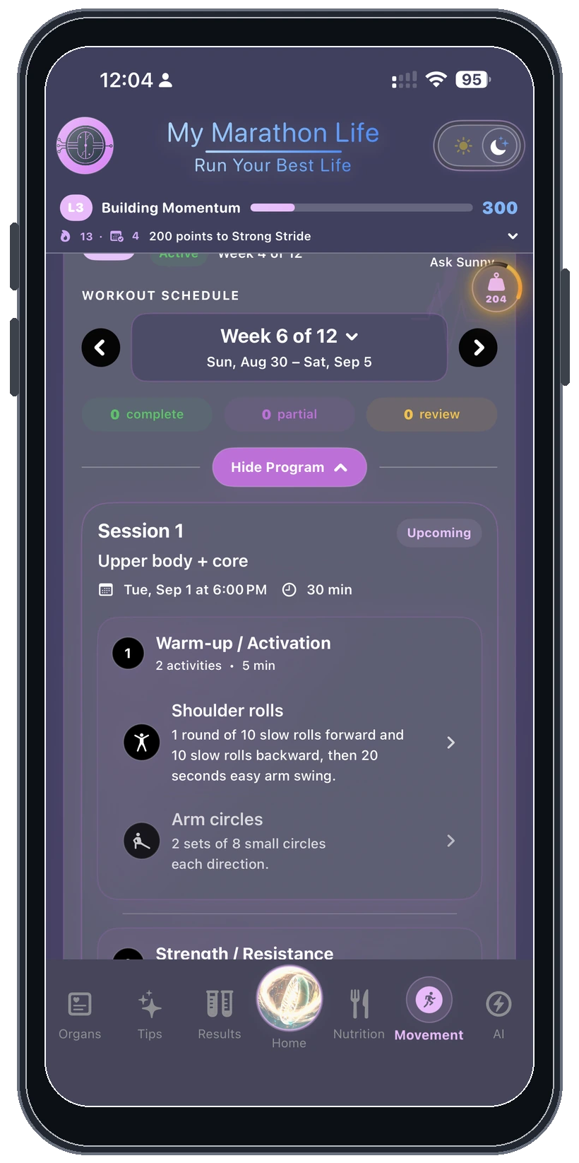 Movement program schedule in dark mode on an angled iPhone
